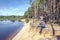 Photographer relaxes in nature near the river