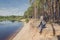 Photographer relaxes in nature near the river