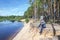 Photographer relaxes in nature near the river