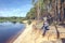 Photographer relaxes in nature near the river