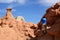 Photographer Shooting Sandstone Rock Formation (Hoodoo) in Goblin Valley