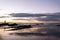 Photographer takes photos during sunset at Snapper Rocks