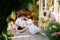 Photographer takes picture couple expecting baby