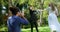 Photographer taking photo of groom and bride 4K 4k
