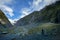 Photographer taking a photograph in franz josef glacier one of most popular natural traveling destination in southland new zealand