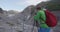 Photographer taking photos of Franz Josef Glacier in New Zealand, South Island.