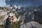 Photographer taking photos in front of impressive mountainscape