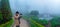 Photographer taking pictures of foggy garden