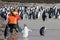 Photographer taking pictures of Gentoo penguins, Saunders, Falkland Islands