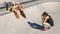 Photographer taking pictures of women at skate park