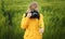 Photographer taking wheat heads picture