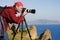 Photographer,tripod,sea,rocks