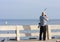 Photographer watching birds at Bang Pu seaside.