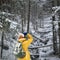 The photographer in winter forest