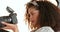 Photographer woman, camera and natural beauty afro of African woman doing a shoot in studio enjoying hobby, job or