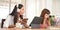 Photographer Women are working together with a computer tablet and laptop at the wooden working desk