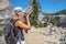 Photographer in Yosemite waterfalls