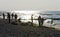 Photographers at the the beach of the Eastern sea