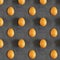Photographic collage made of whole raw orange egg with shadow on chalk board black background. Top view. Horizontal with