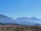 Photographic shot of the Albanian landscape in the countryside facing a Snowy mountain