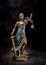 Photography of bronze themis sculpture, femida or justice goddess on dark background