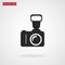 Photography camera with flash. Vector icon.
