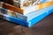 Photography canvas prints. Stacked colorful photos with gallery wrapping method of canvas stretching on stretcher bar, lateral