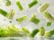 photography of CELERY falling from the sky, hyperpop colour scheme. glossy, white background Heap of celery sticks