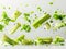 photography of CELERY falling from the sky, hyperpop colour scheme. glossy, white background Heap of celery sticks