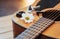 Photography classical guitar on a light brown background