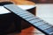 Photography classical guitar on a light brown background