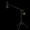 Photography high speed studio flash on boom with stand isolated on black
