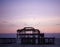 Photography image Brighton Pier beach at twilight sunset with birds flocking taken South coast England UK