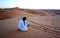 Photographying sandy footprints and tyre tracks