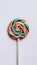 PhotoStock Artistic capture of lollipop against a white isolated background