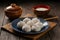 PhotoStock Elegant capture of traditional Japanese dumplings, dango, in studio lighting