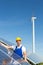 Photovoltaic engineer or installer installing solar panel