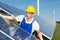 Photovoltaic engineer or installer installing solar panel