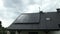 Photovoltaic panels on the roof of family house, solar panels. Environment and technology concepts.
