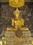 Phra Buddha Deva Patimakorn, a Gorgeous Sitting Postured Buddha Image in the Ordination Hall of Wat Pho Temple with Amazing Mural