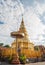 Phra That Hari Phunchai golden pagoda in Thai temple.