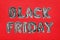 Phrase BLACK FRIDAY made of foil balloon letters on background