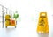 Phrase CAUTION WET FLOOR on safety sign and yellow mop bucket with cleaning supplies, indoors