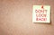The phrase don\'t look back written on sticky note. room for text