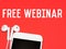 Phrase FREE WEBINAR with smartphone and earphone isolated on red background.