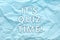 Phrase IT`S QUIZ TIME on crumpled light blue paper