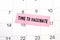 The phrase Time to Vaccinate written on a pink sticky note posted on a calendar or planner page. Deadline concept read a reminder