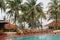 Phu Quoc, Viet Nam - August 12, 2017: Beautiful landscape with swimming pool and coconut trees around