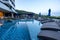 Phuket, Thailand - Apr 04 2017 : Hotel swimming pool with sunbeds and bar in hotel