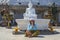 Phuket, Thailand- The buddha statue sits on top of the Nakkerd Hills. Big Buddha Phuket. Buddhist holy monk in saffron dress